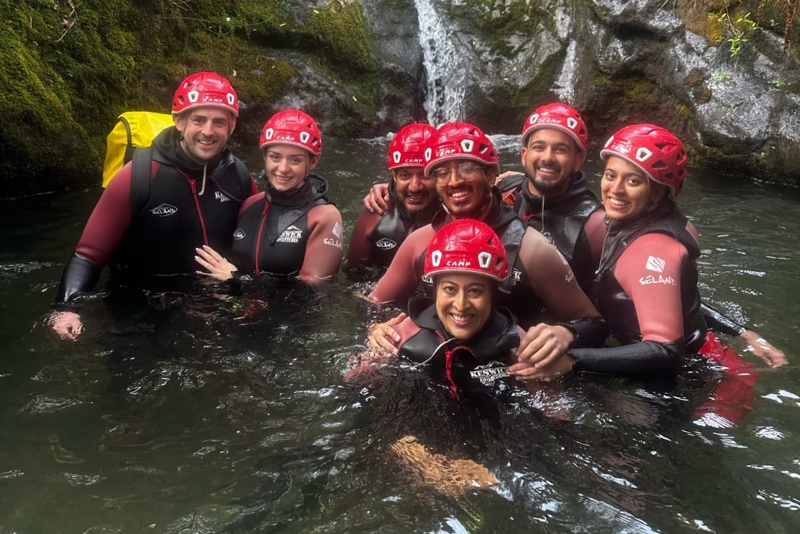 Groups posing for a photo in the ghyll