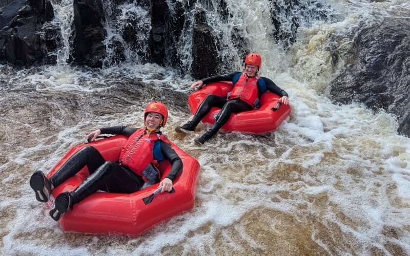 Couple tubing on the River Tees rapids