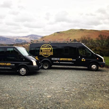 Keswick Adventures Vans with mountains in the background