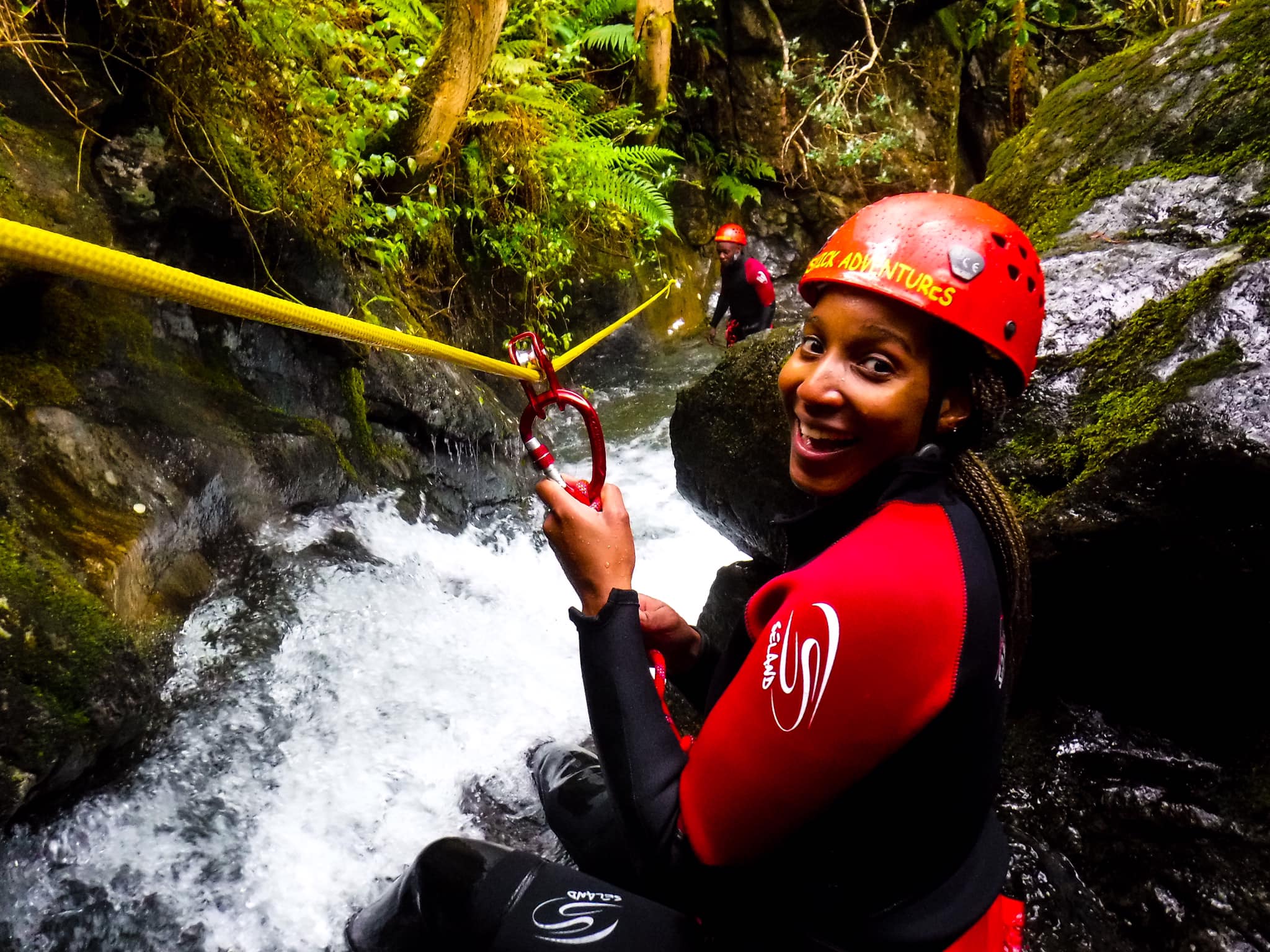 Woman canyoning with Keswick Adventures in the Lake District