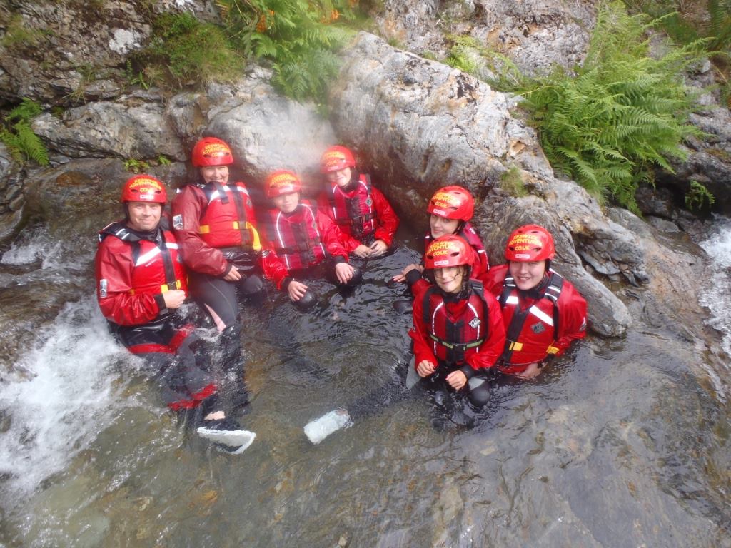 Family ghyll scrambling in the Lake District