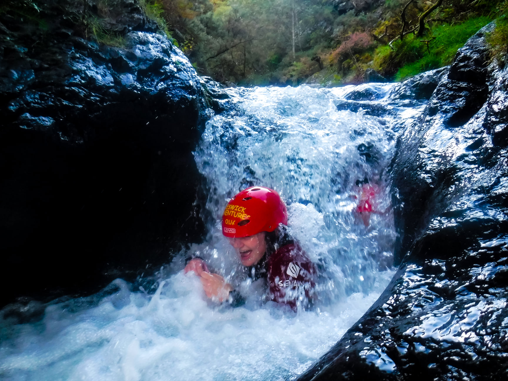 Person ghyll scrambling in the Lake District