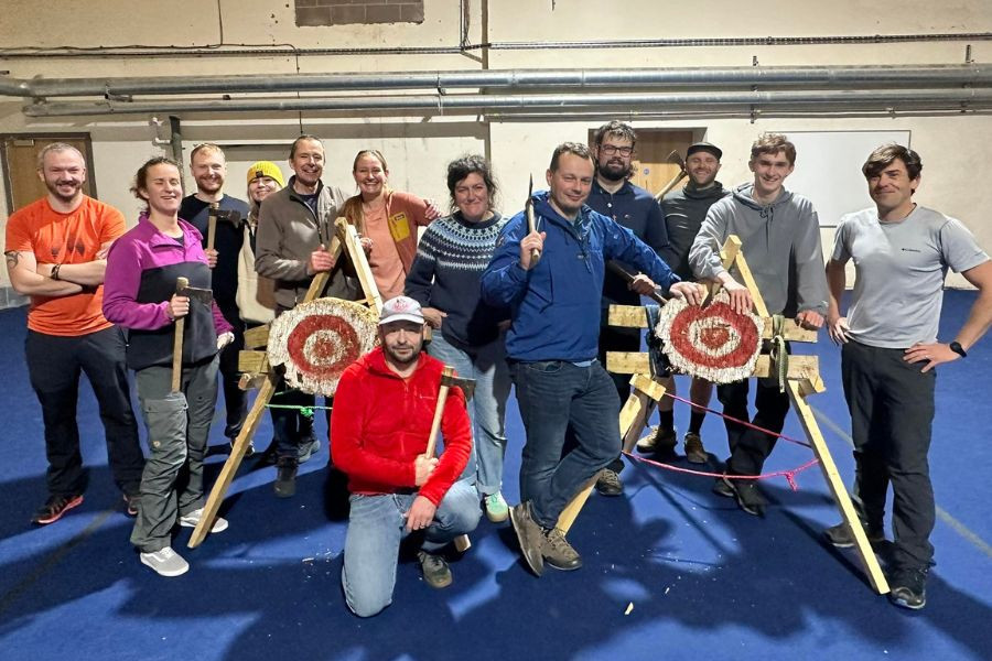 A group at an axe throwing session