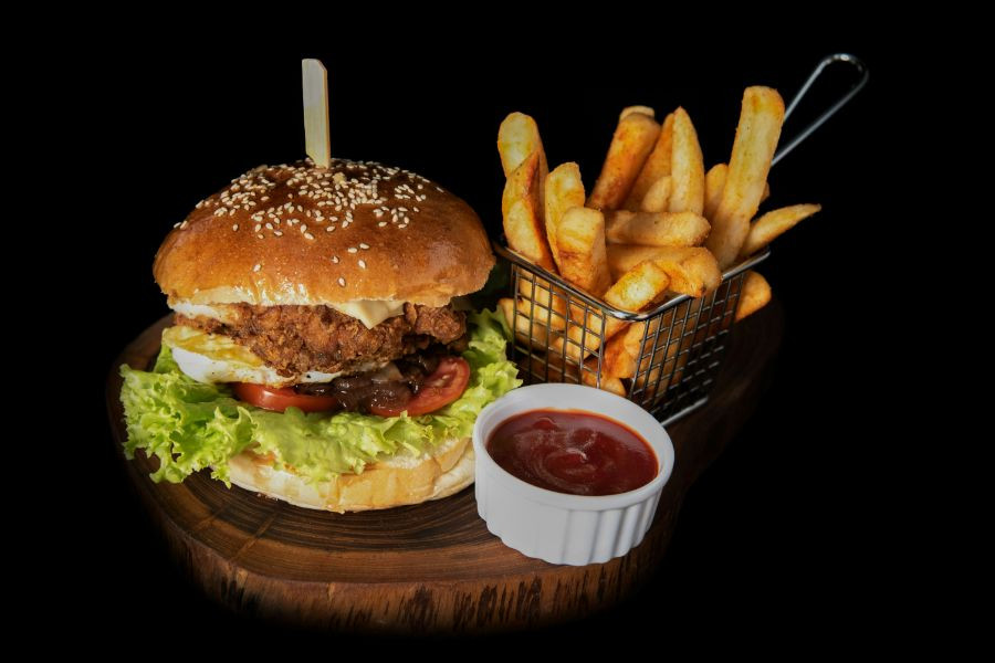 Burger with chips and tomato sauce